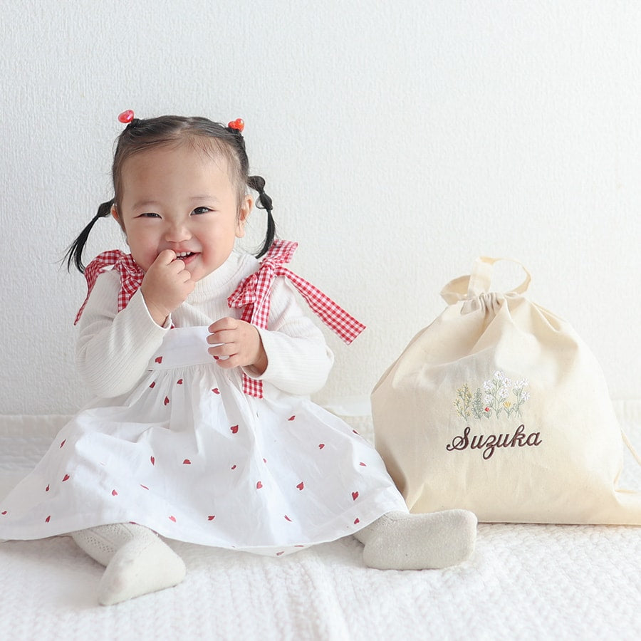 刺繍名入れ 1歳誕生日 一升餅 名前入りリュック・生成り・アンダンテ