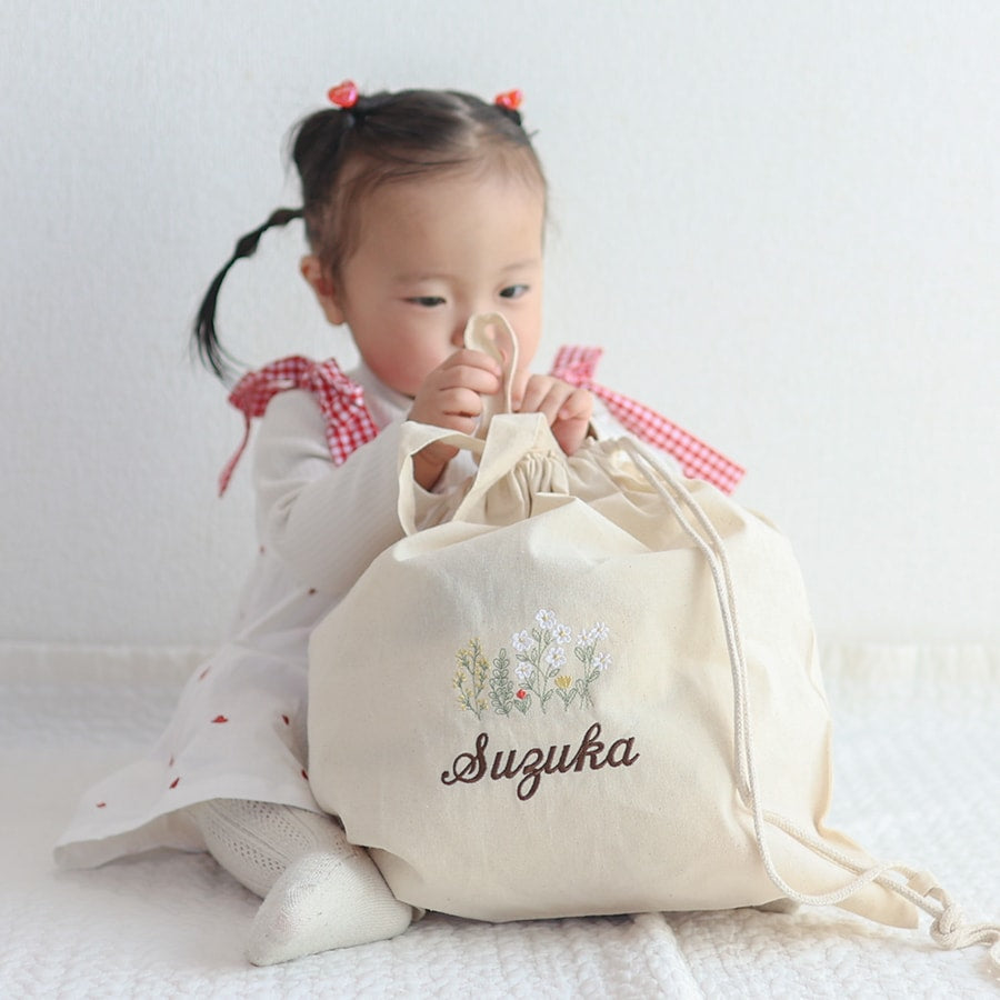 刺繍名入れ 1歳誕生日 一升餅 名前入りリュック・生成り・アンダンテ