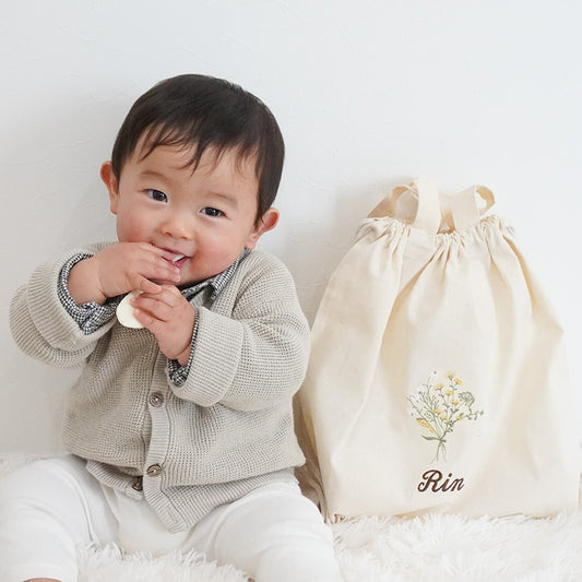 刺繍名入れ 1歳誕生日 一升餅 名前入りリュック・生成り・リベルテ