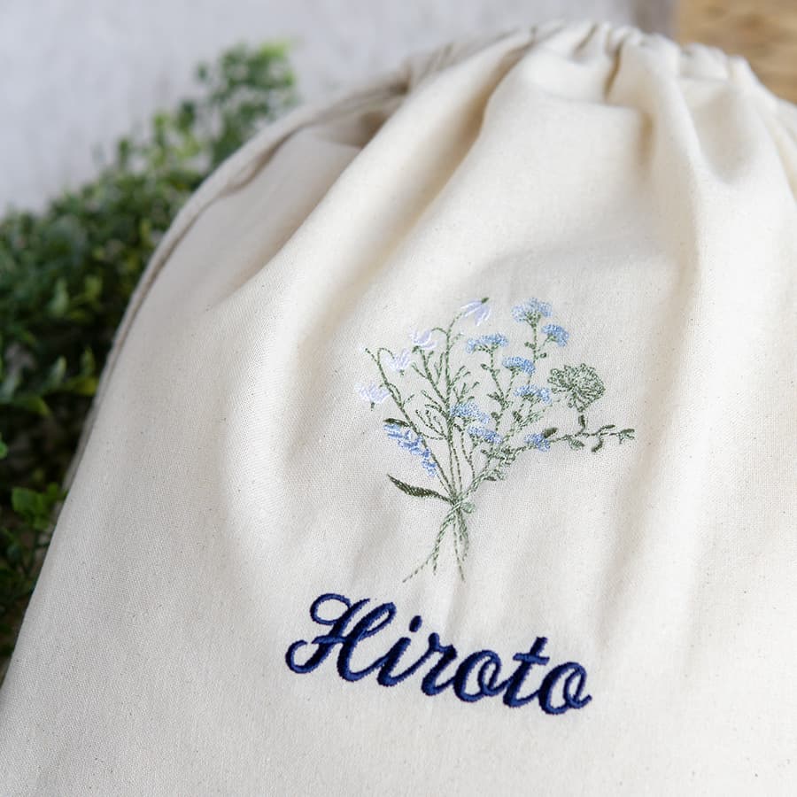 刺繍名入れ 1歳誕生日 一升餅 名前入りリュック・生成り・フルリ・ブルー