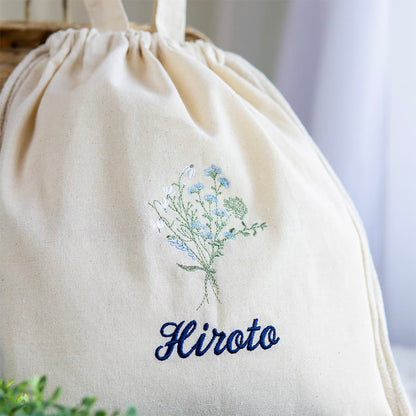 刺繍名入れ 1歳誕生日 一升餅 名前入りリュック・生成り・フルリ・ブルー