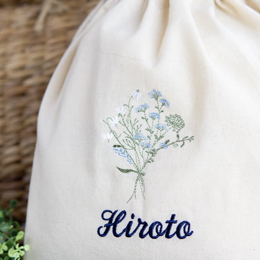 刺繍名入れ 1歳誕生日 一升餅 名前入りリュック・生成り・フルリ・ブルー