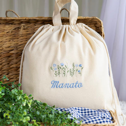 刺繍名入れ 1歳誕生日 一升餅 名前入りリュック・生成り・フローラリー・ブルー