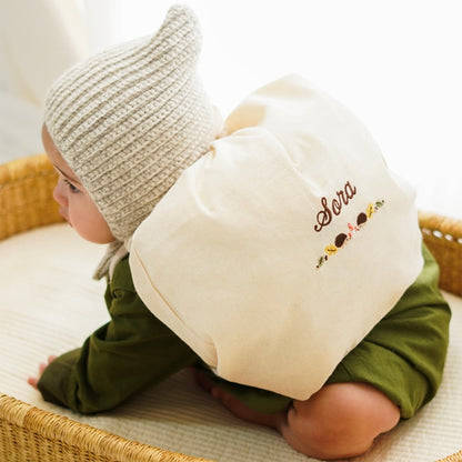 刺繍名入れ 1歳誕生日 一升餅 名前入りリュック・生成り・エリソン