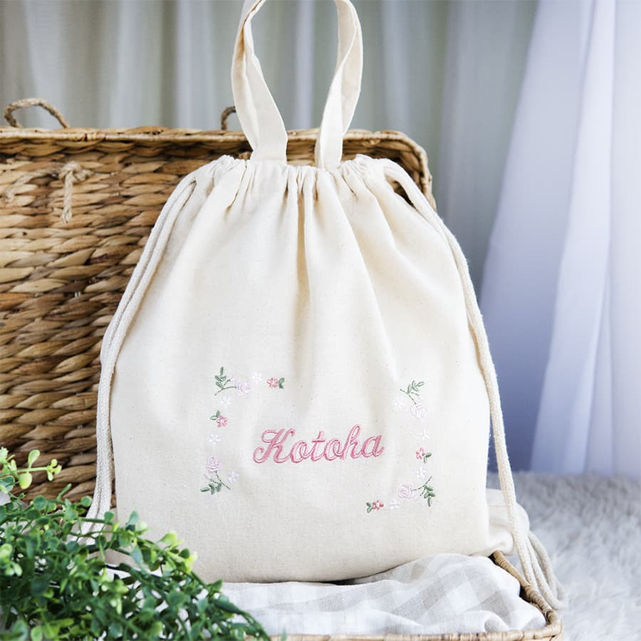 刺繍名入れ 1歳誕生日 一升餅 名前入りリュック・生成り・フルールミニョン・ピンク