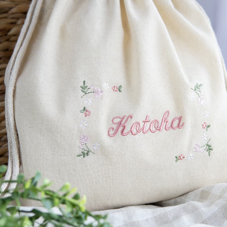 刺繍名入れ 1歳誕生日 一升餅 名前入りリュック・生成り・フルールミニョン・ピンク