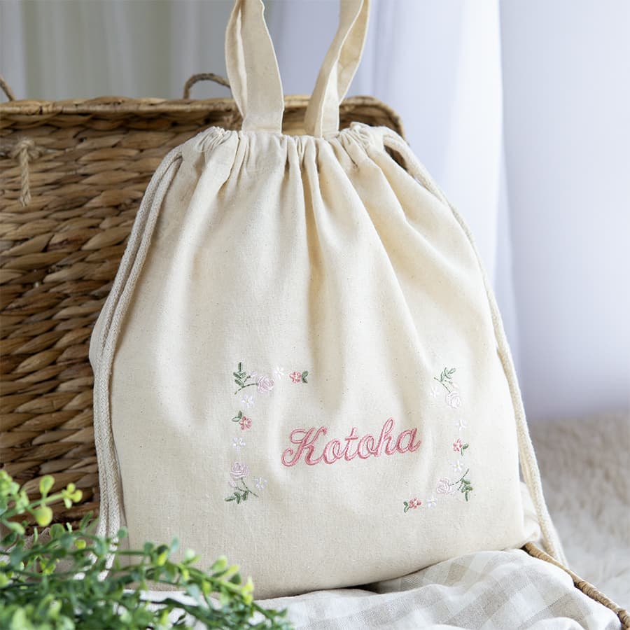 刺繍名入れ 1歳誕生日 一升餅 名前入りリュック・生成り・フルールミニョン・ピンク