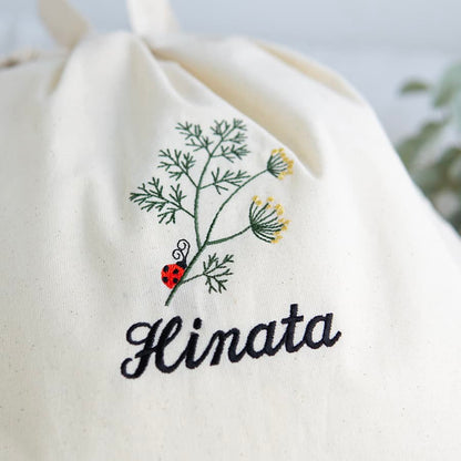 刺繍名入れ 1歳誕生日 一升餅 名前入りリュック・生成り・アネット