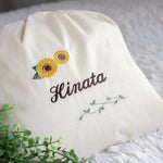 画像をギャラリービューアに読み込む, 刺繍名入れ 1歳誕生日 一升餅 名前入りリュック・生成り・アンジュエ
