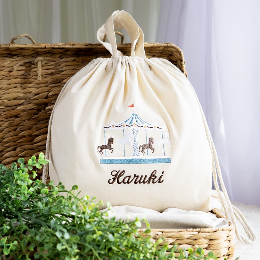 刺繍名入れ 1歳誕生日 一升餅 名前入りリュック・生成り・メリーゴーランド・ジョワ