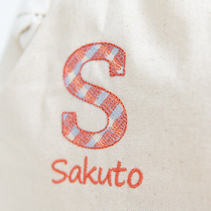 名前入りおむつ巾着・チェック刺繍