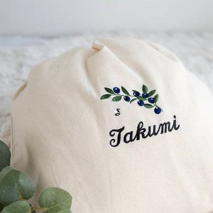 刺繍名入れ 1歳誕生日 一升餅 名前入りリュック・生成り・ブルーベリー