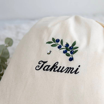 刺繍名入れ 1歳誕生日 一升餅 名前入りリュック・生成り・ブルーベリー