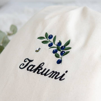 刺繍名入れ 1歳誕生日 一升餅 名前入りリュック・生成り・ブルーベリー