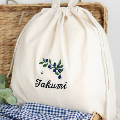 刺繍名入れ 1歳誕生日 一升餅 名前入りリュック・生成り・ブルーベリー