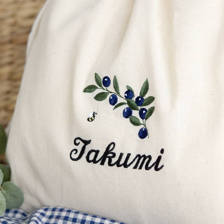刺繍名入れ 1歳誕生日 一升餅 名前入りリュック・生成り・ブルーベリー