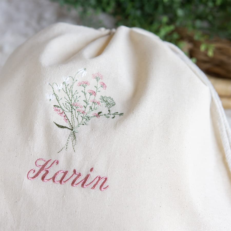 刺繍名入れ 1歳誕生日 一升餅 名前入りリュック・生成り・フルリ・ピンク