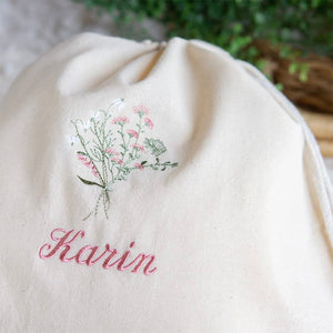 刺繍名入れ 1歳誕生日 一升餅 名前入りリュック・生成り・フルリ・ピンク