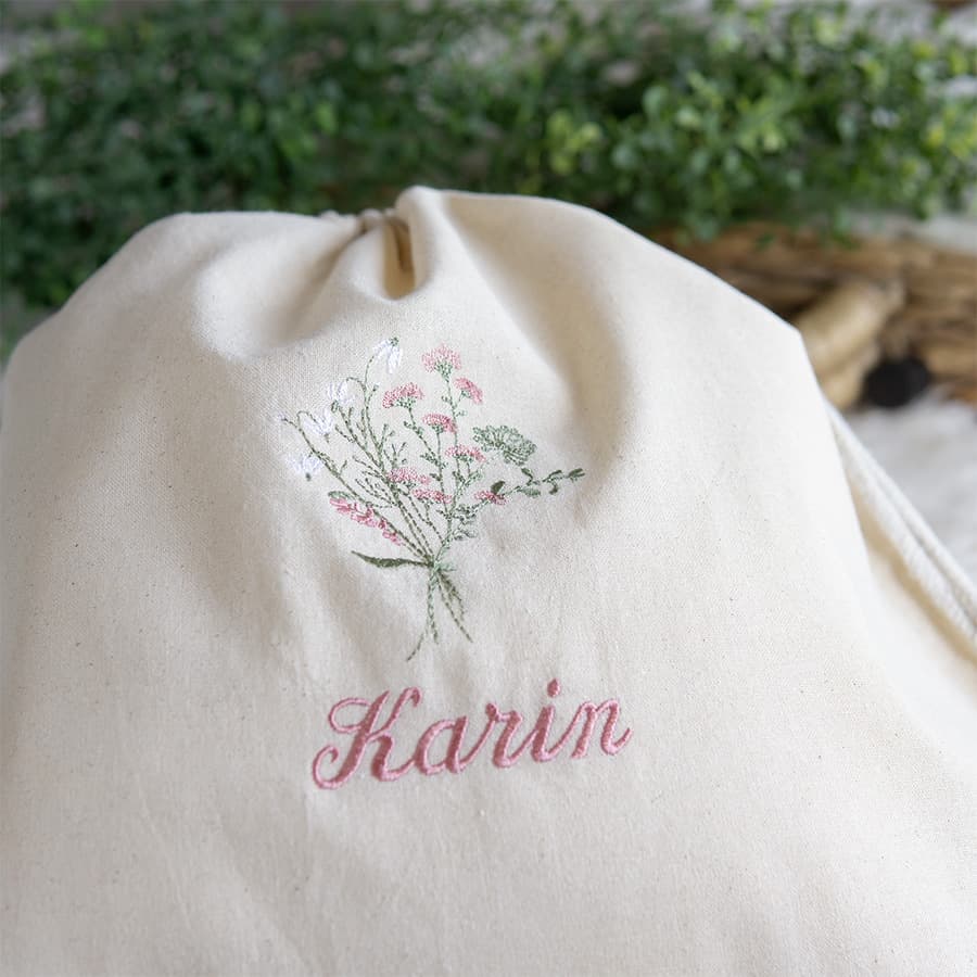 刺繍名入れ 1歳誕生日 一升餅 名前入りリュック・生成り・フルリ・ピンク
