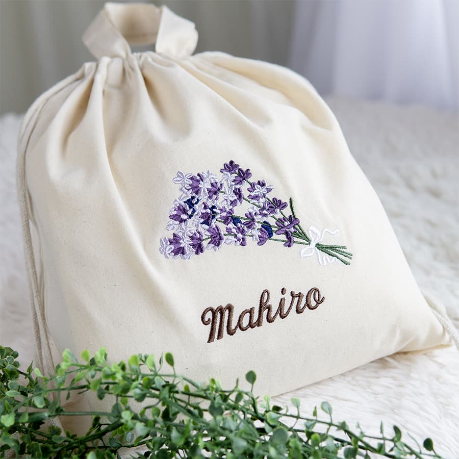 刺繍名入れ 1歳誕生日 一升餅 名前入りリュック・生成り・ラベンダーブーケ