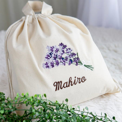刺繍名入れ 1歳誕生日 一升餅 名前入りリュック・生成り・ラベンダーブーケ