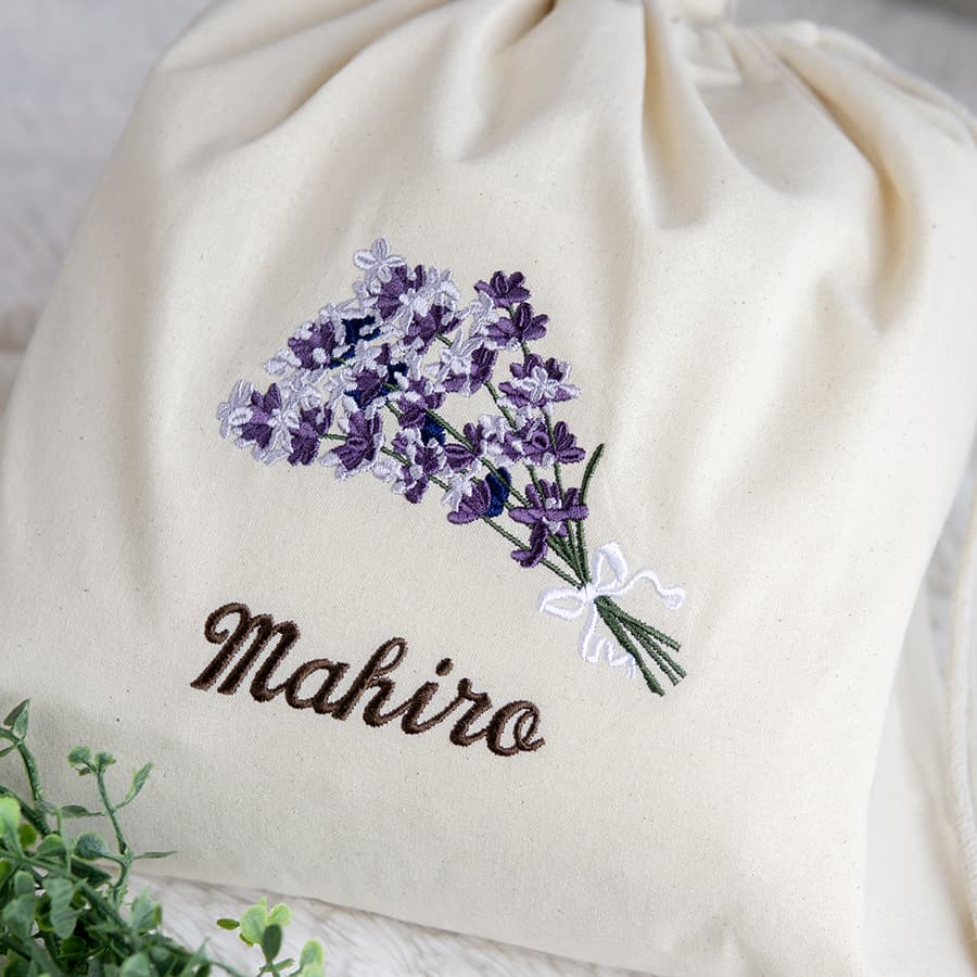 刺繍名入れ 1歳誕生日 一升餅 名前入りリュック・生成り・ラベンダーブーケ