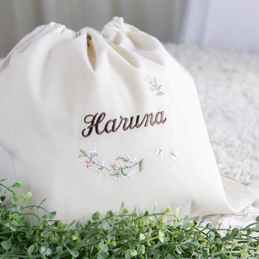 1歳誕生日 刺繍名入れ 一升餅 名前入りリュック・生成り・リンディ・ピンク
