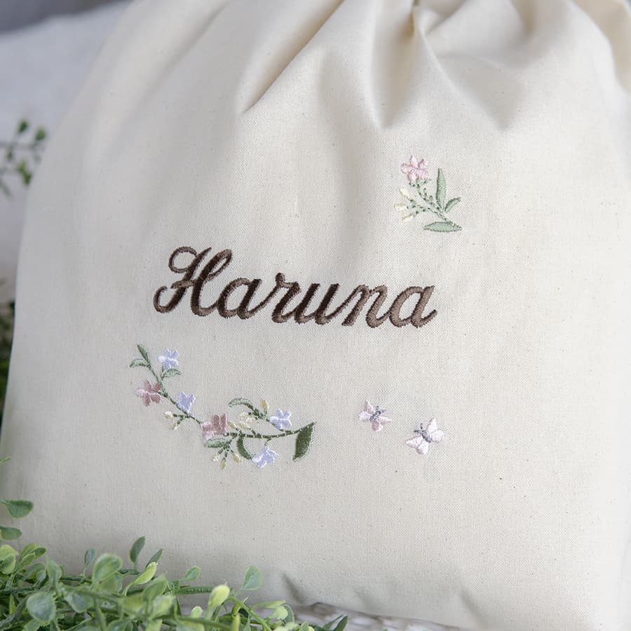 1歳誕生日 刺繍名入れ 一升餅 名前入りリュック・生成り・リンディ・ピンク
