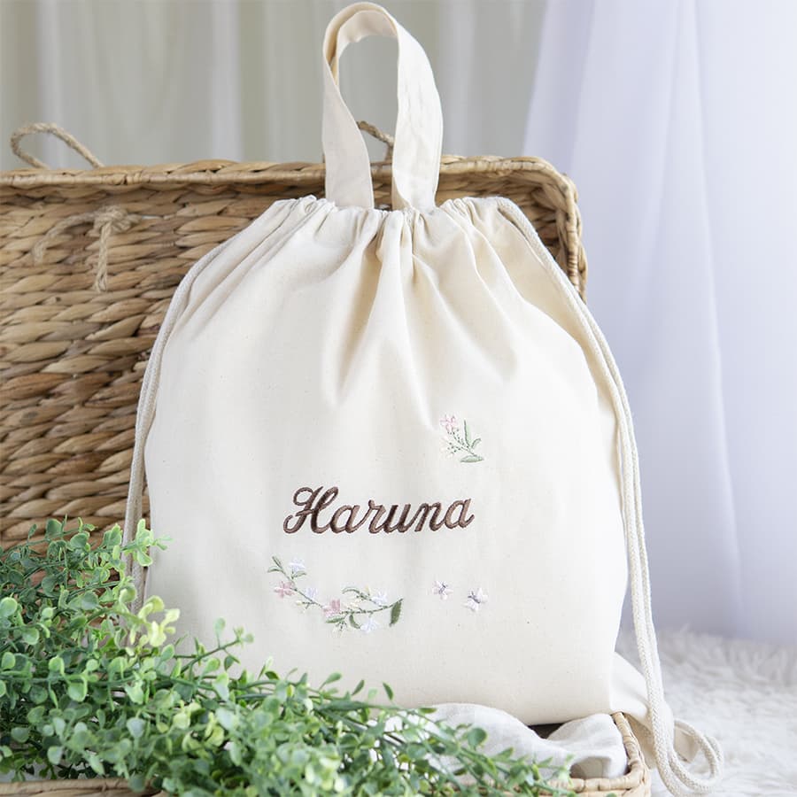 1歳誕生日 刺繍名入れ 一升餅 名前入りリュック・生成り・リンディ・ピンク