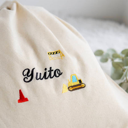 刺繍名入れ 1歳誕生日 一升餅 名前入りリュック・生成り・ブルドーザー