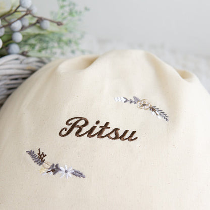 刺繍名入れ 1歳誕生日 一升餅 名前入りリュック・生成り・モデラート