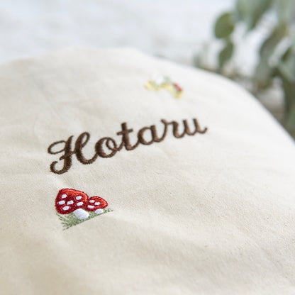 刺繍名入れ 1歳誕生日 一升餅 名前入りリュック・生成り・シャンピニオン