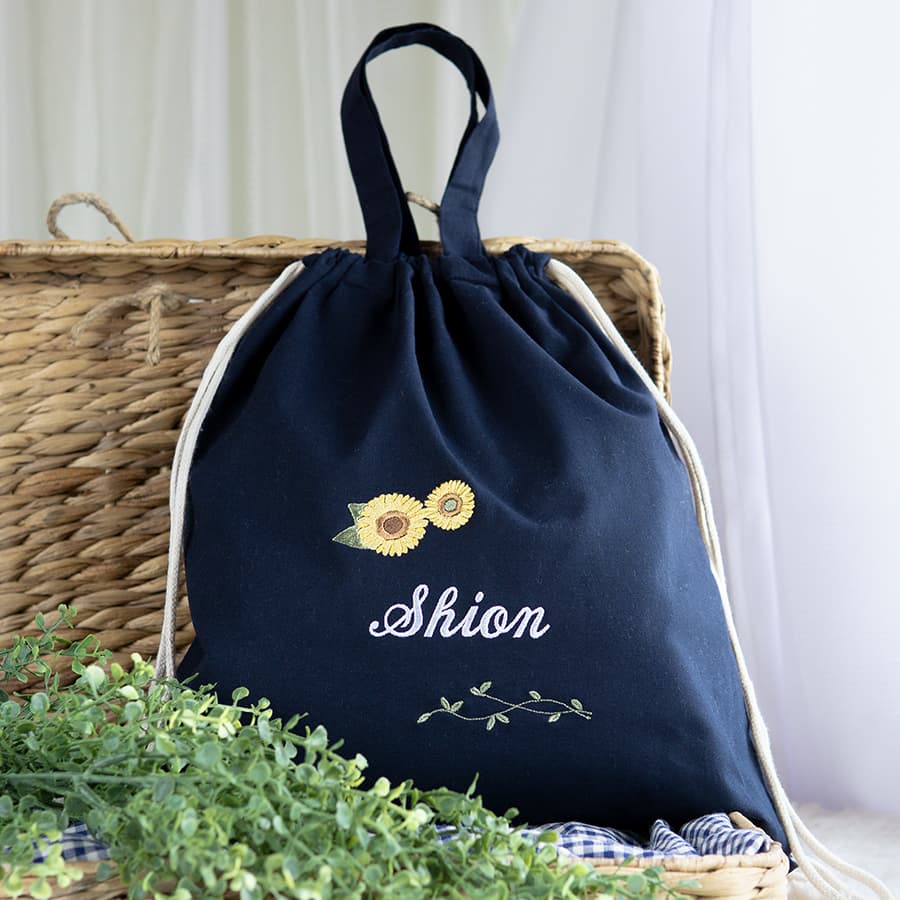 刺繍名入れ 1歳誕生日 一升餅 名前入りリュック・ネイビー・アンジュエ