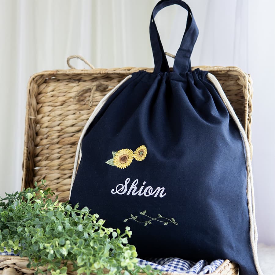 刺繍名入れ 1歳誕生日 一升餅 名前入りリュック・ネイビー・アンジュエ