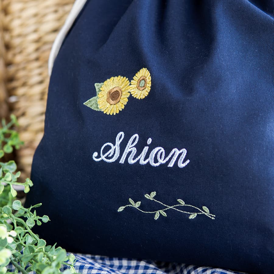 刺繍名入れ 1歳誕生日 一升餅 名前入りリュック・ネイビー・アンジュエ