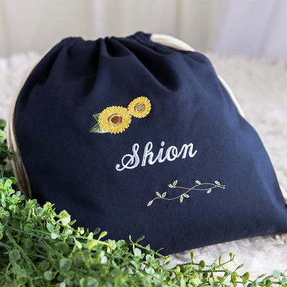 刺繍名入れ 1歳誕生日 一升餅 名前入りリュック・ネイビー・アンジュエ