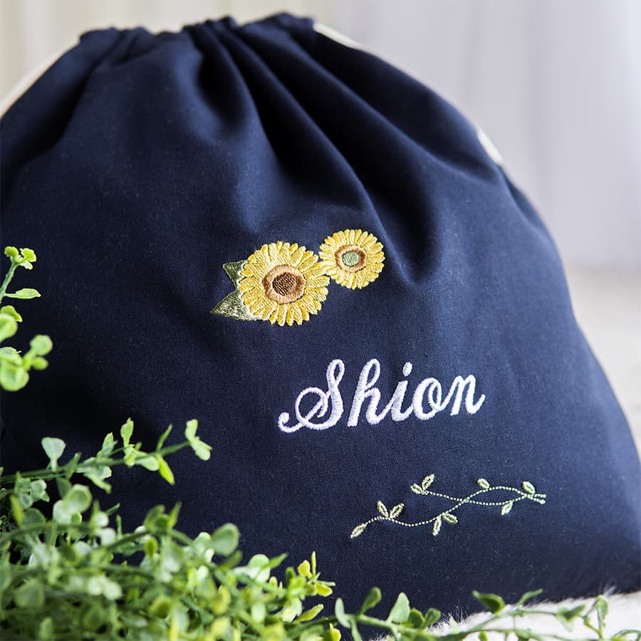 刺繍名入れ 1歳誕生日 一升餅 名前入りリュック・ネイビー・アンジュエ