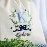 画像をギャラリービューアに読み込む, 刺繍名入れ 1歳誕生日 一升餅 名前入りリュック・生成り・アンブレーム・ブルー
