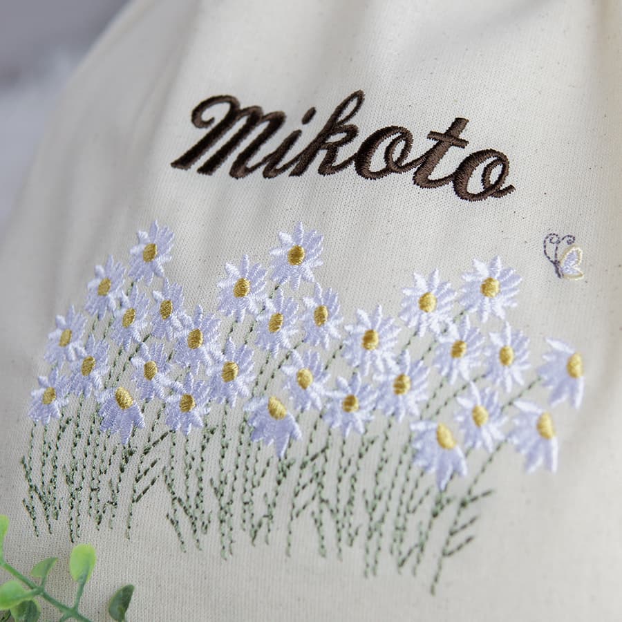 刺繍名入れ 1歳誕生日 一升餅 名前入りリュック・生成り・フルール・ド・コリーヌ