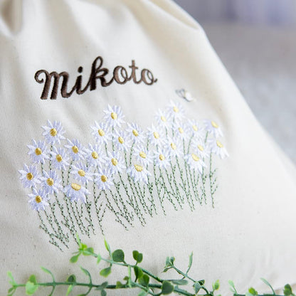 刺繍名入れ 1歳誕生日 一升餅 名前入りリュック・生成り・フルール・ド・コリーヌ