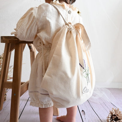 刺繍名入れ 一升餅 1歳誕生日 名前入りリュック・生成り・ラベンダー