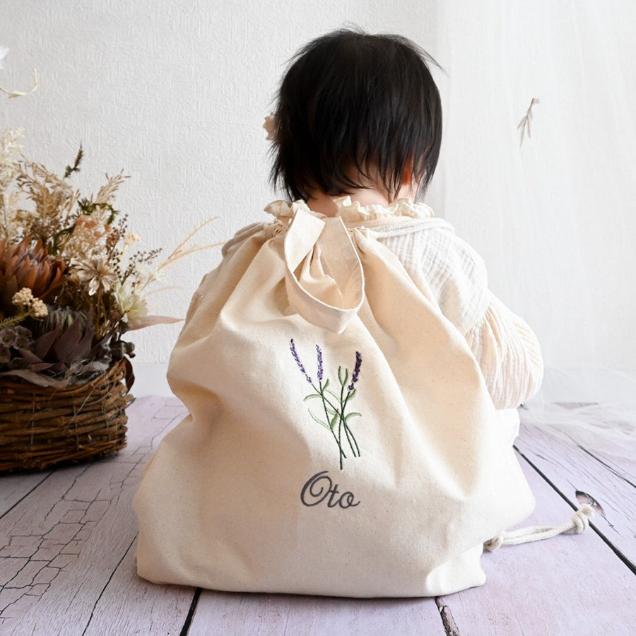 刺繍名入れ 一升餅 1歳誕生日 名前入りリュック・生成り・ラベンダー