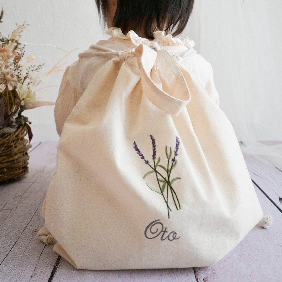 刺繍名入れ 一升餅 1歳誕生日 名前入りリュック・生成り・ラベンダー