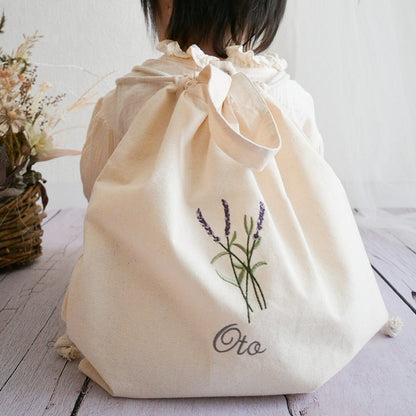 刺繍名入れ 一升餅 1歳誕生日 名前入りリュック・生成り・ラベンダー