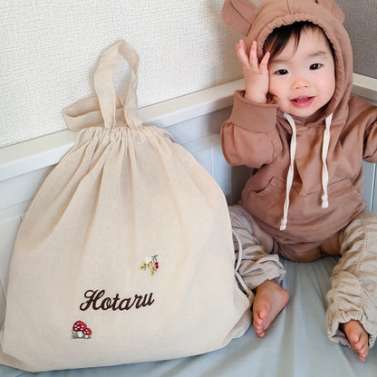 刺繍名入れ 1歳誕生日 一升餅 名前入りリュック・生成り・シャンピニオン