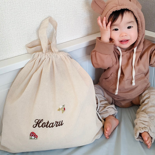 刺繍名入れ 1歳誕生日 一升餅 名前入りリュック・生成り・シャンピニオン