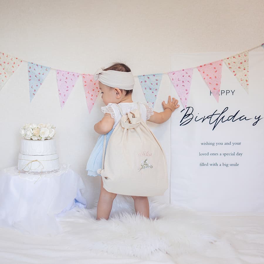 一升餅 1歳誕生日 刺繍名入れ 名前入りリュック・生成り・クラッチブーケ